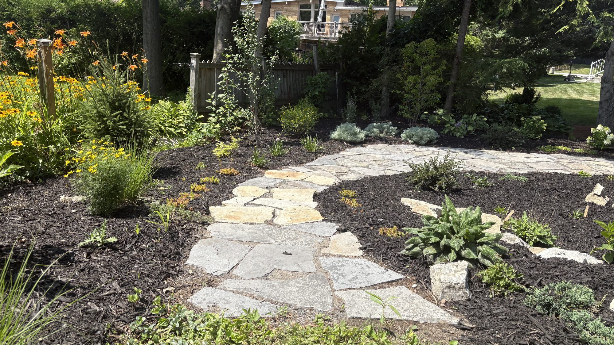 Overview of completed accessible garden transformation viewed from the house in Nepean