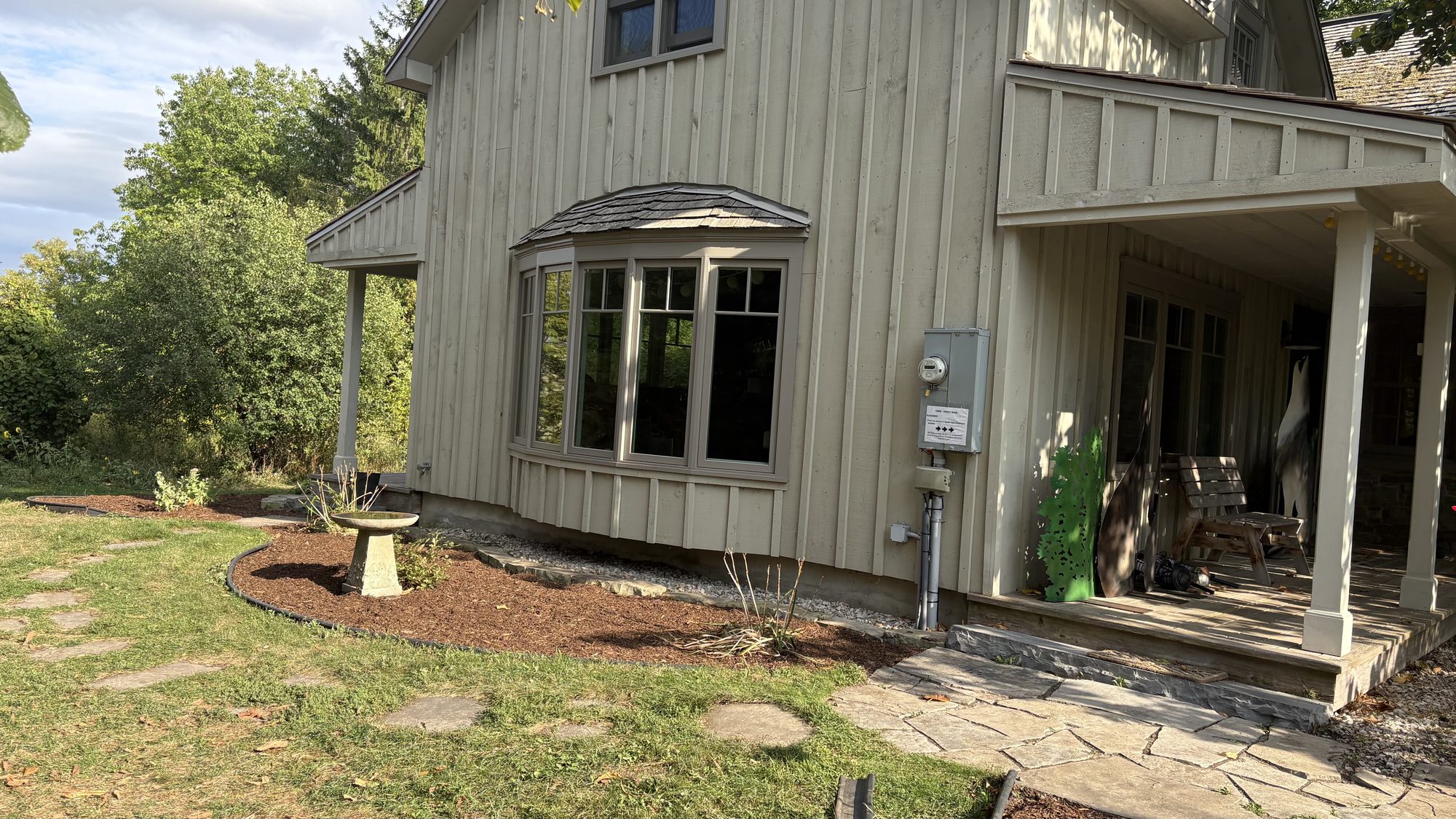 Restored garden area with shaped hedges and clear borders on Winchester property