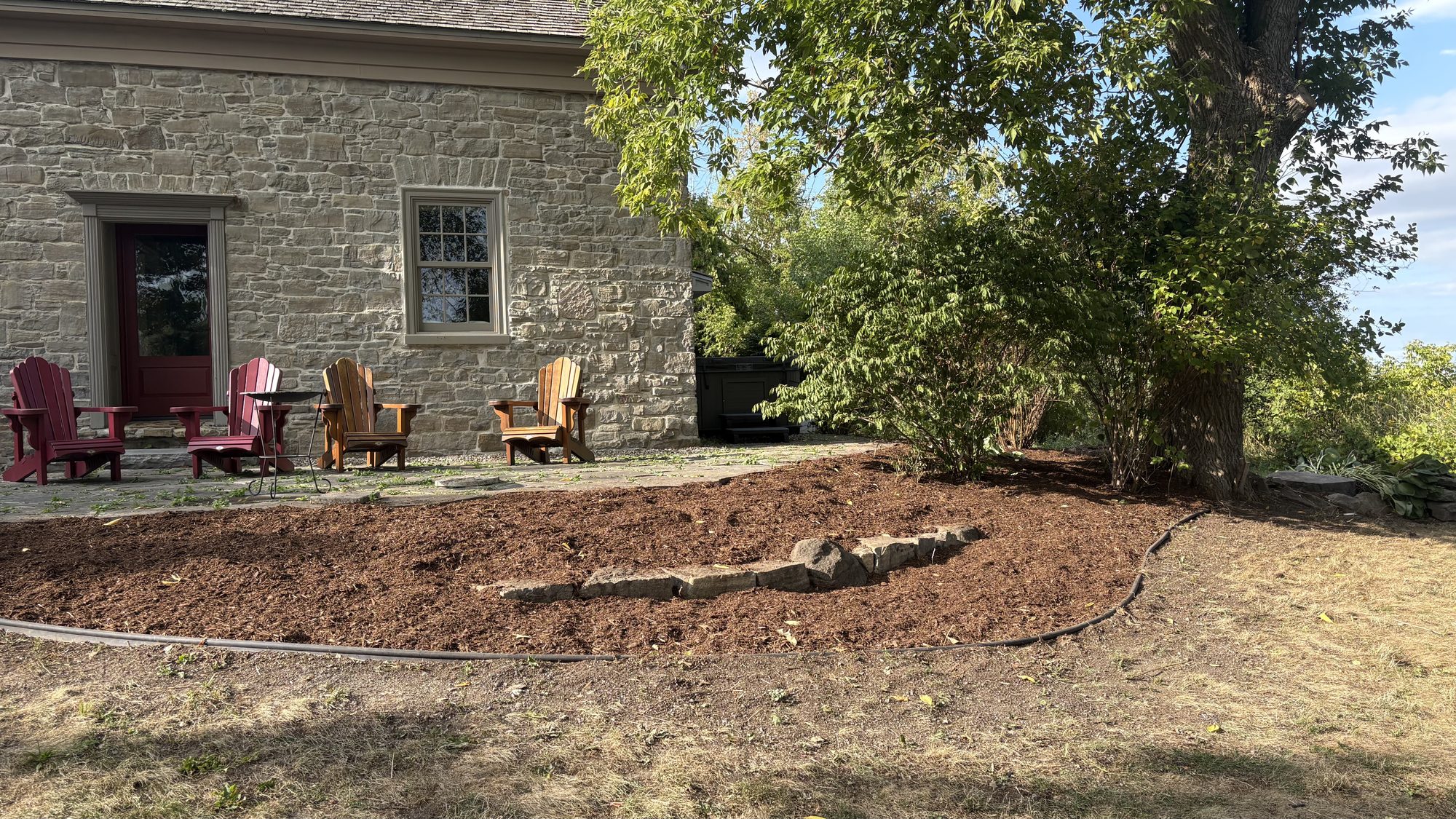 Previously hidden garden features revealed after overgrowth removal on Winchester property