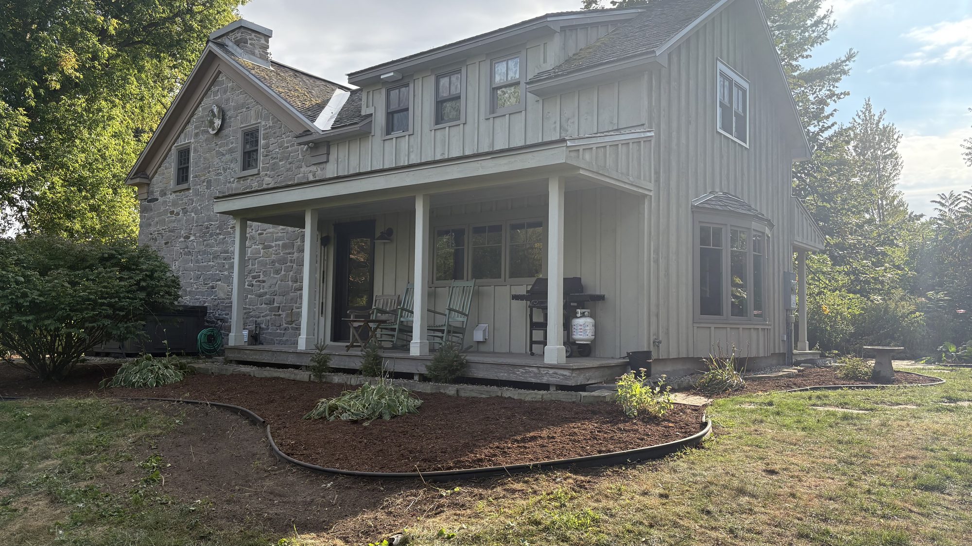 Completed restoration view showing open accessible yard space after full property cleanup