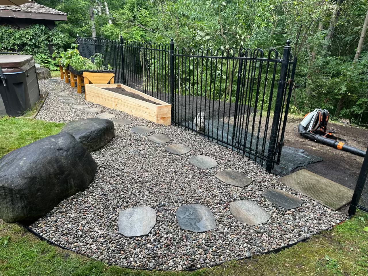 Margaret's Barrhaven property after full cleanup with restored garden beds